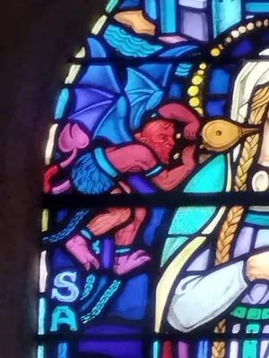 Vitrail Baie 3 : Sainte-Geneviève de Nanterre dans l'Église Notre-Dame à Digosville